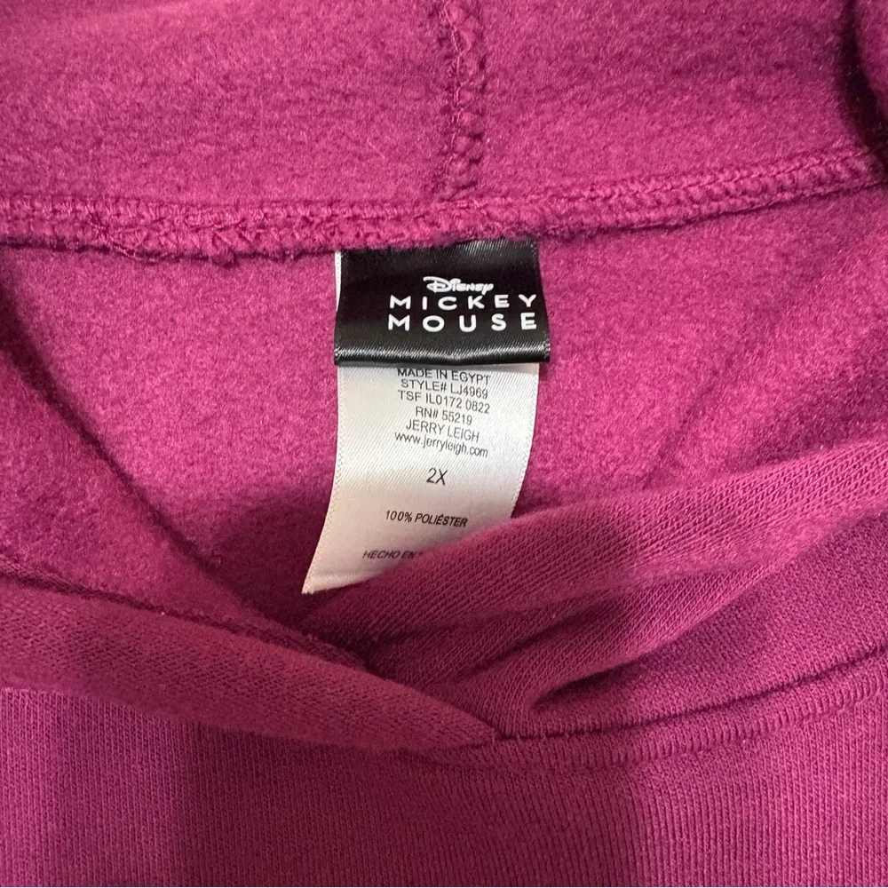 Disney purple hoodie featuring a graphic of Mickey and Minnie Mouse. - Picture 3 of 5